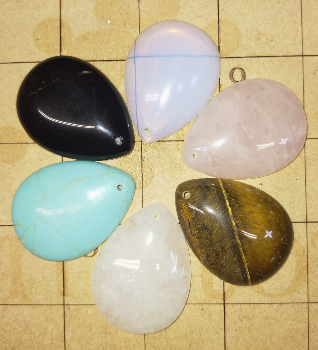 Drilled teardrop pendant. Select stone type