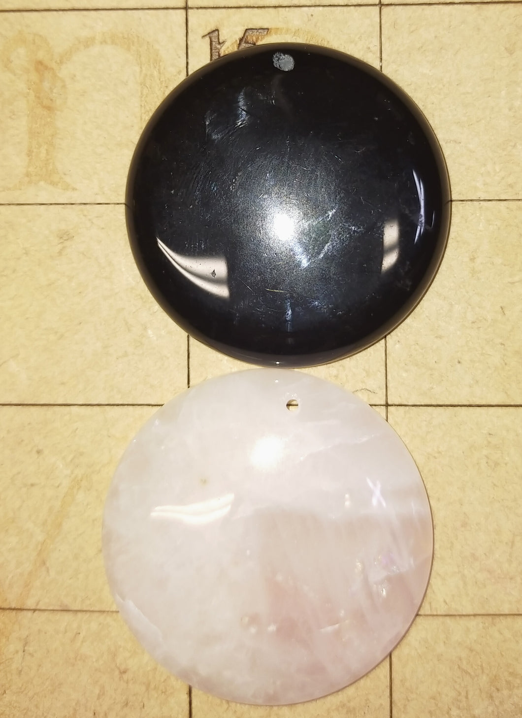 Drilled round pendant. Rose quartz & obsidian