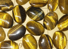 Load image into Gallery viewer, Tigers eye oval cabochons. Various sizes
