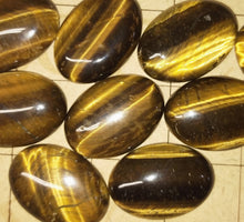 Load image into Gallery viewer, Tigers eye oval cabochons. Various sizes
