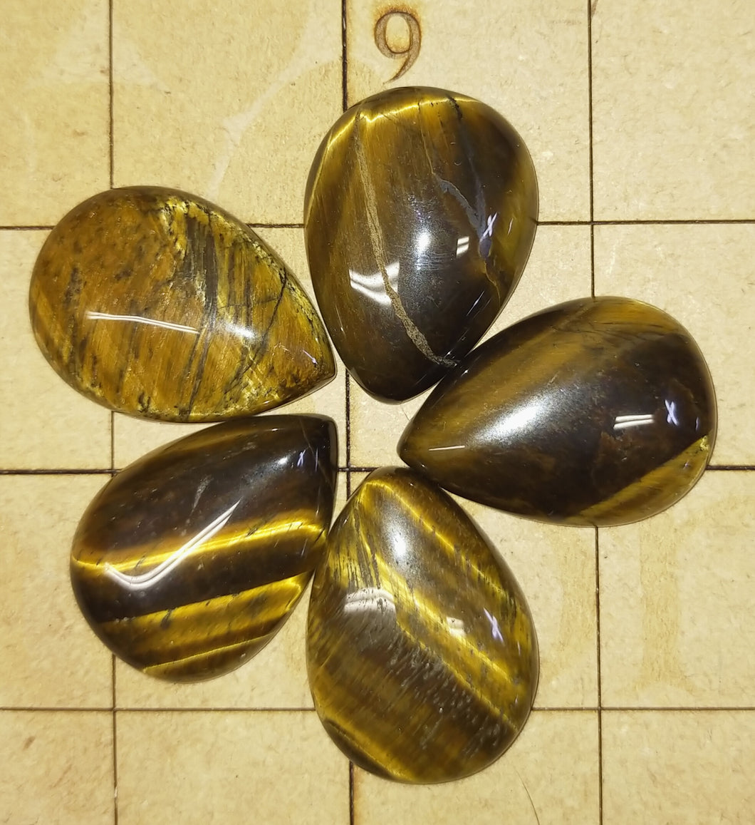 Tigers eye teardrop cabochon. Various sizes